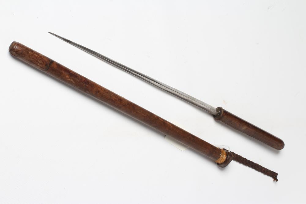 A VICTORIAN SWAGGER SWORD STICK, with 11 3/4" rectangular section blade, leather stick and partial Image