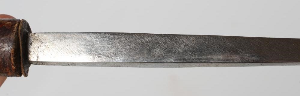 A VICTORIAN SWAGGER SWORD STICK, with 11 3/4" rectangular section blade, leather stick and partial Image