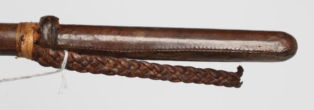 A VICTORIAN SWAGGER SWORD STICK, with 11 3/4" rectangular section blade, leather stick and partial Image