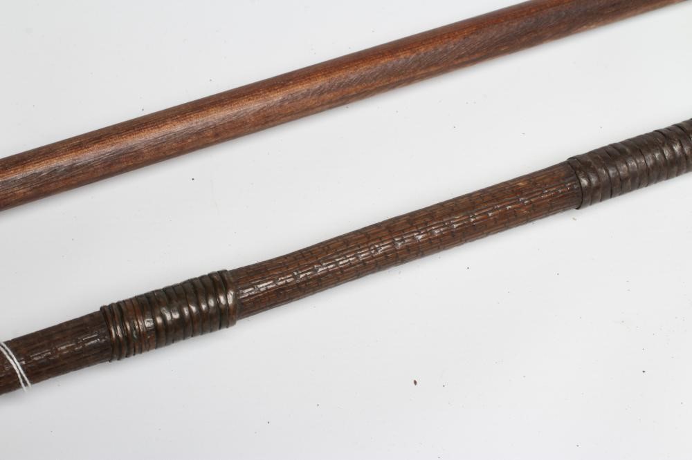 TWO TRIBAL FISHING SPEARS, one with barbed tip and original shaft with weighted wrappings, the other Image