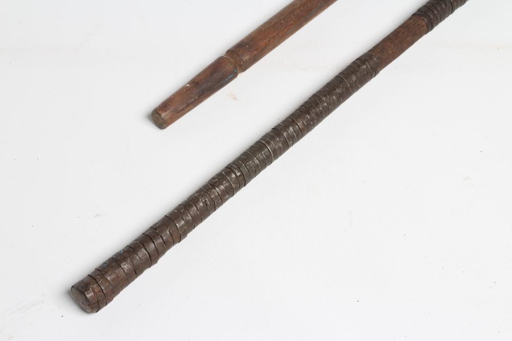 TWO TRIBAL FISHING SPEARS, one with barbed tip and original shaft with weighted wrappings, the other Image