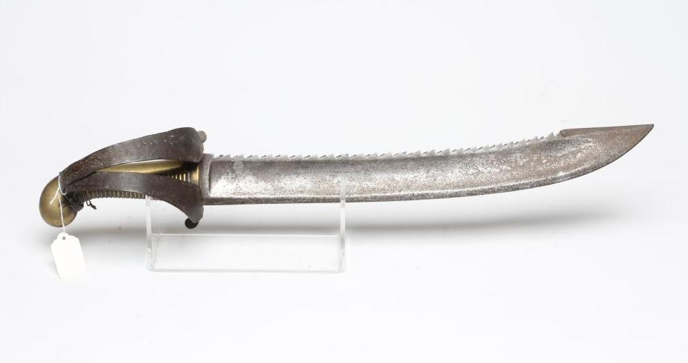A RUSSIAN 1827 PATTERN PIONEER SHORT SWORD with 19 1/2" saw back blade, brass hilt with contemporary Image