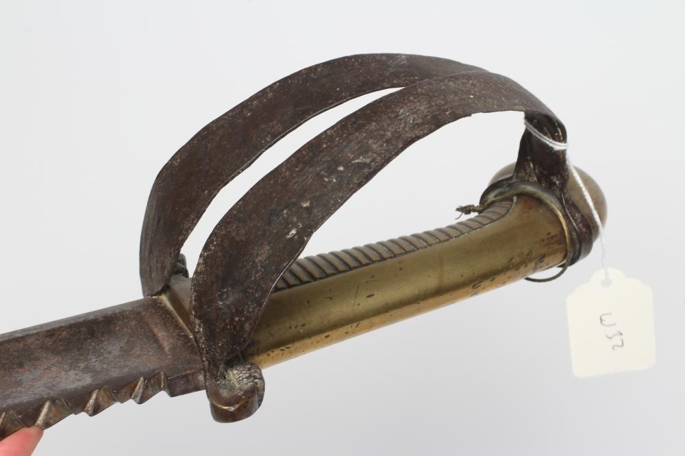A RUSSIAN 1827 PATTERN PIONEER SHORT SWORD with 19 1/2" saw back blade, brass hilt with contemporary Image