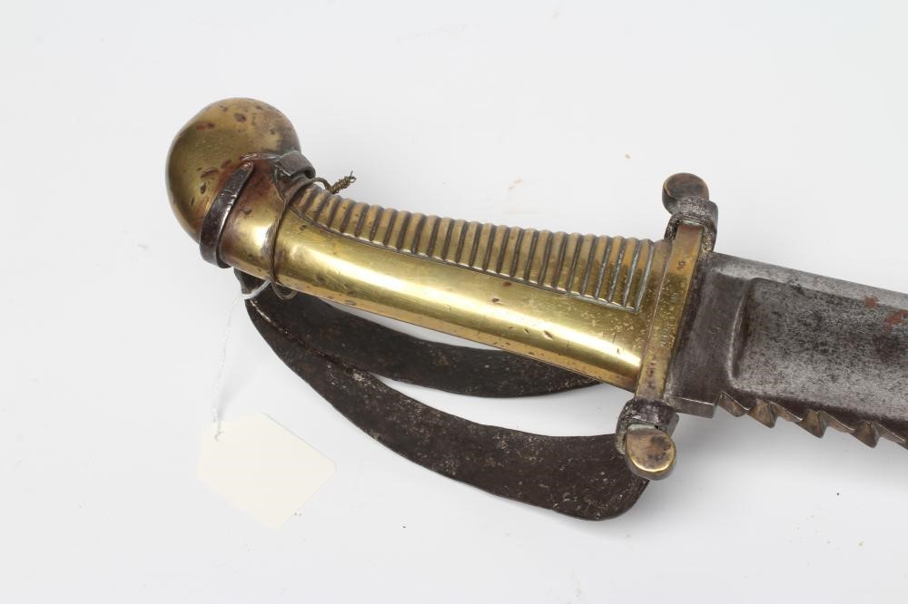 A RUSSIAN 1827 PATTERN PIONEER SHORT SWORD with 19 1/2" saw back blade, brass hilt with contemporary Image