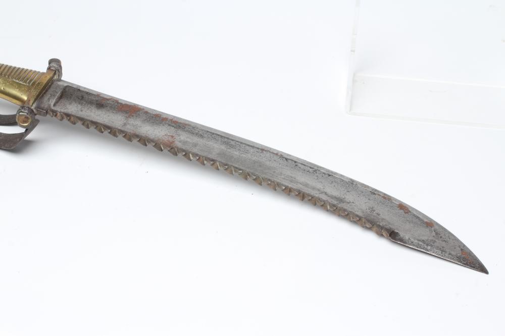 A RUSSIAN 1827 PATTERN PIONEER SHORT SWORD with 19 1/2" saw back blade, brass hilt with contemporary Image