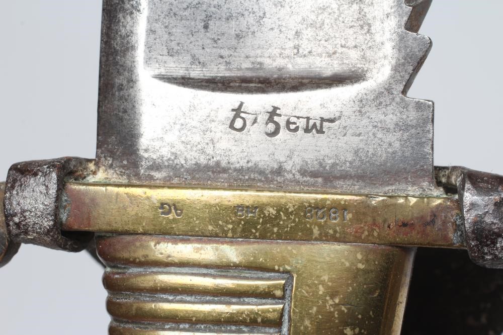 A RUSSIAN 1827 PATTERN PIONEER SHORT SWORD with 19 1/2" saw back blade, brass hilt with contemporary Image