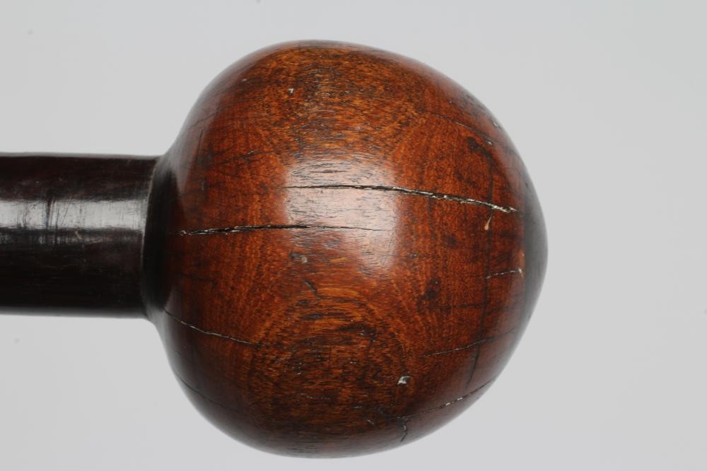 A ZULU KNOBKERRIE, late 19th century, with 28" shaft tapering to the grip and bi-colour head, 30 Image