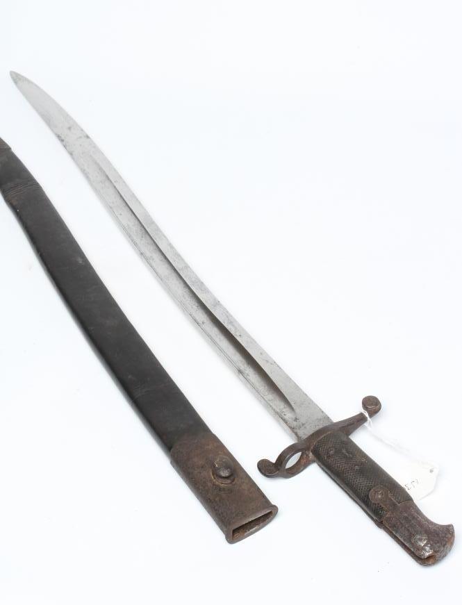 A BRITISH 1860 PATTERN YAGATAN BAYONET with 23" blade, typical hilt and leather scabbard, 29" long Image