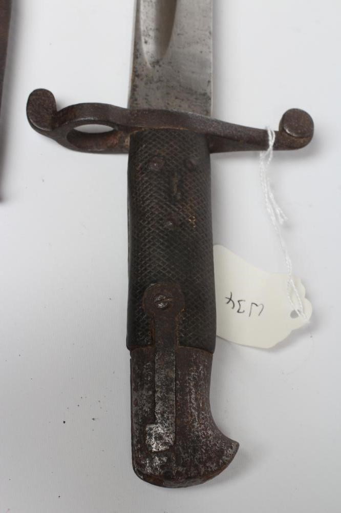 A BRITISH 1860 PATTERN YAGATAN BAYONET with 23" blade, typical hilt and leather scabbard, 29" long Image