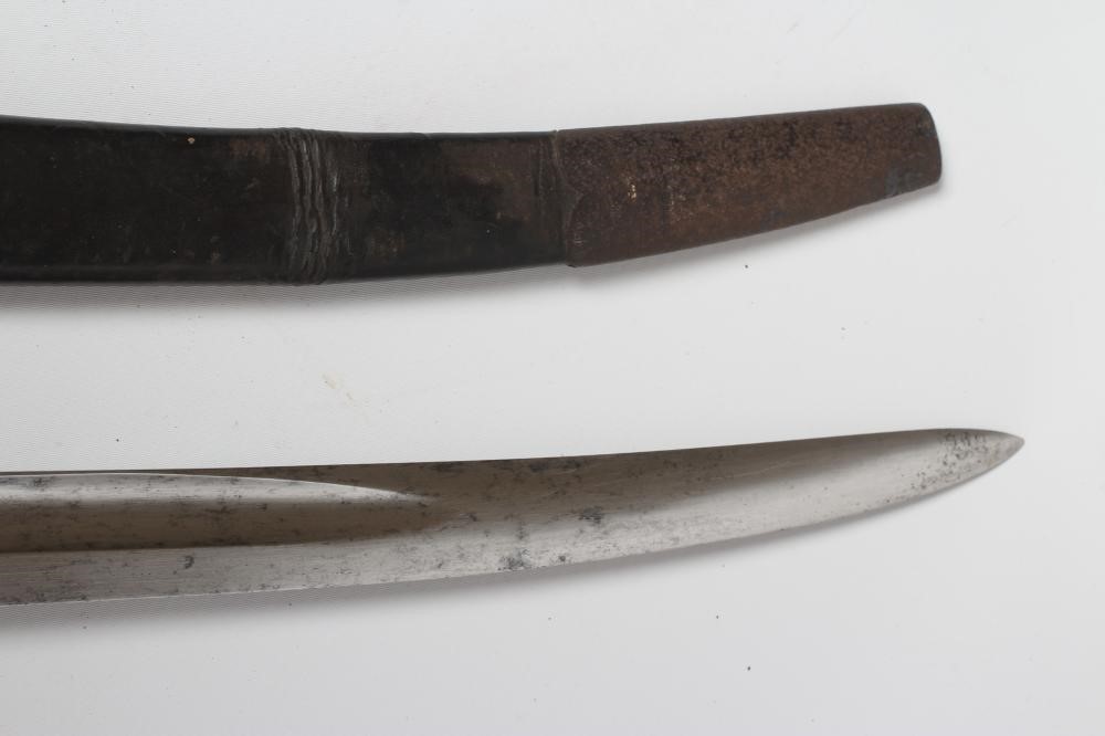 A BRITISH 1860 PATTERN YAGATAN BAYONET with 23" blade, typical hilt and leather scabbard, 29" long Image