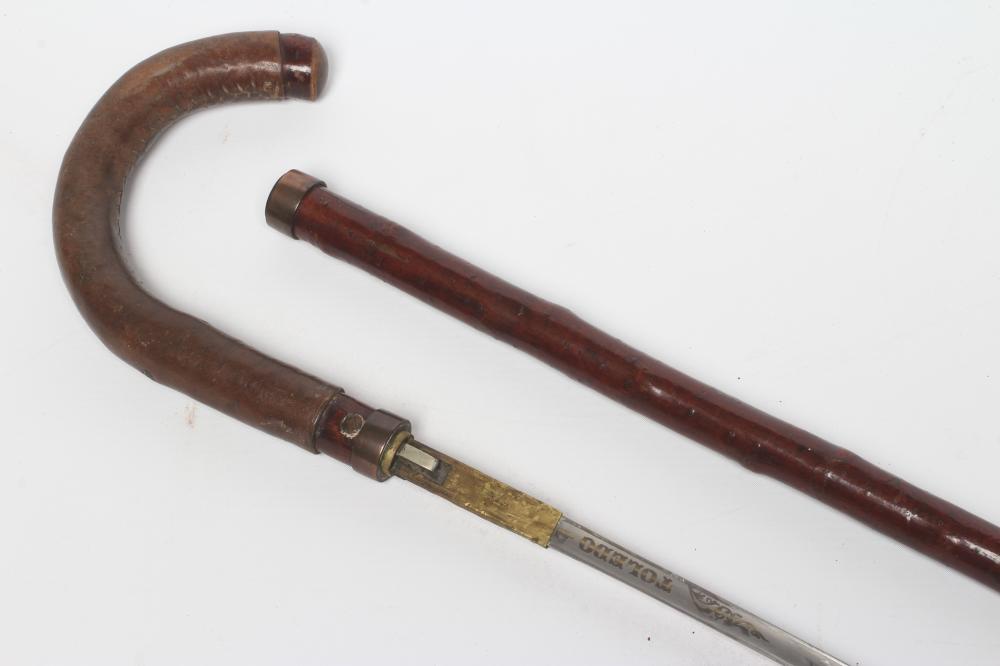 A TOLEDO SWORD STICK, late 19th/early 20th century, with 24 1/2" triangular section acid etched Image