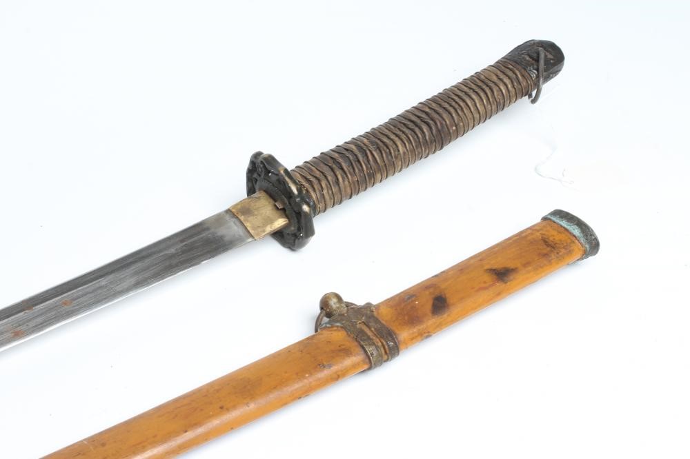 A JAPANESE WWII OFFICER'S KATANA, with 26 3/4" curved blade, military mounts, leather wrapped grip Image