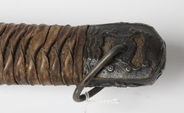 A JAPANESE WWII OFFICER'S KATANA, with 26 3/4" curved blade, military mounts, leather wrapped grip Image