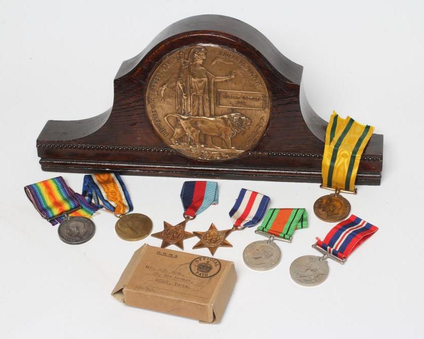 THE MEDALS AND DEATH PLAQUE OF THREE BROTHERS Image