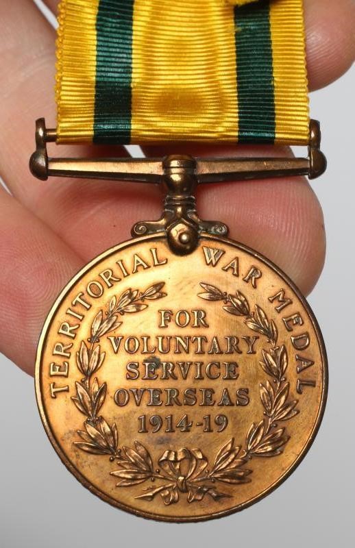 THE MEDALS AND DEATH PLAQUE OF THREE BROTHERS Image