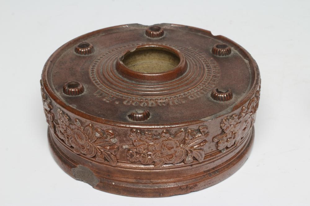 A DOCUMENTARY BROWN SALTGLAZE STONEWARE CIRCULAR INKWELL Image