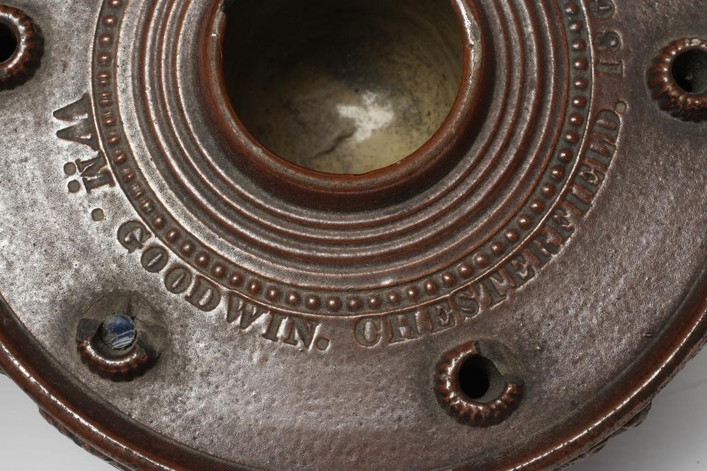 A DOCUMENTARY BROWN SALTGLAZE STONEWARE CIRCULAR INKWELL Image