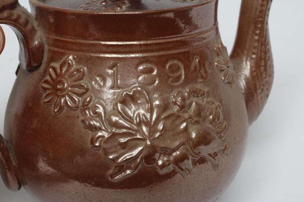 A DOCUMENTARY BROWN SALTGLAZE STONEWARE CIRCULAR INKWELL Image