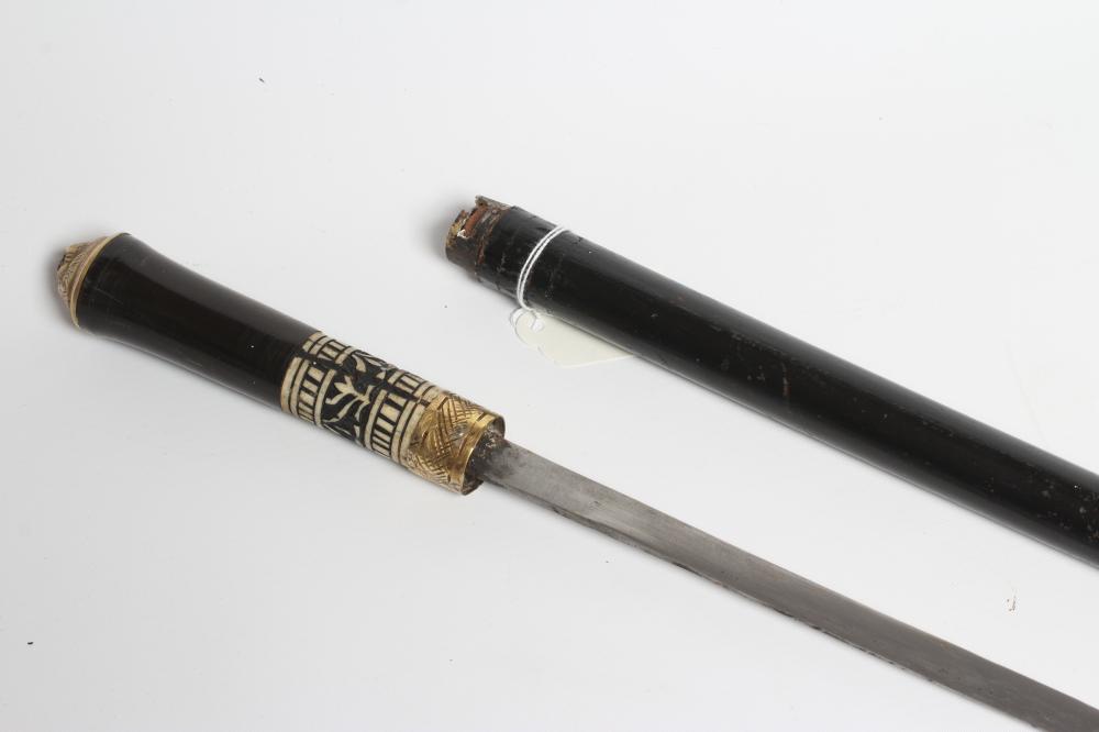 AN INDIAN SWORD STICK with 21" blade, carved bone ferrule and lion mask pommel, 35 3/4" long (Est. Image