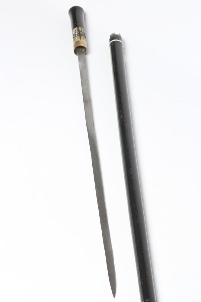 AN INDIAN SWORD STICK with 21" blade, carved bone ferrule and lion mask pommel, 35 3/4" long (Est. Image