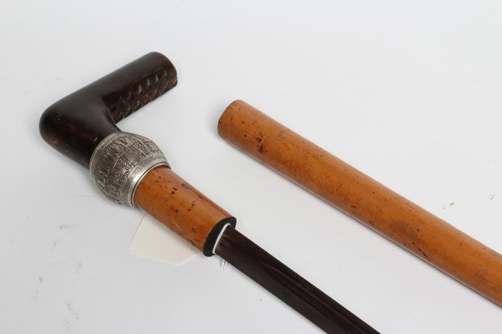 A MALACCA SWORD STICK, early 20th century, the 28 1/2" blade stamped MOLE, white metal decorative Image