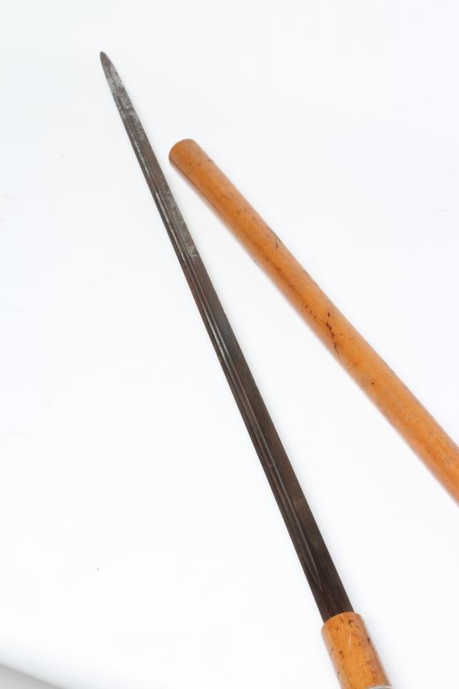 A MALACCA SWORD STICK, early 20th century, the 28 1/2" blade stamped MOLE, white metal decorative Image