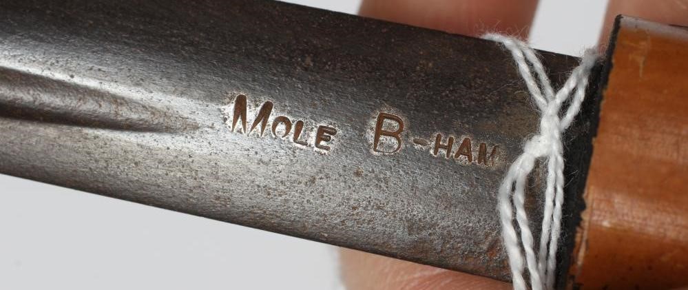 A MALACCA SWORD STICK, early 20th century, the 28 1/2" blade stamped MOLE, white metal decorative Image