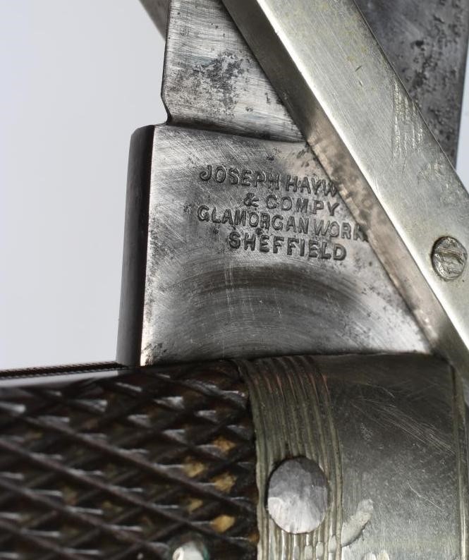 A FOLDING BOWIE KNIFE Image