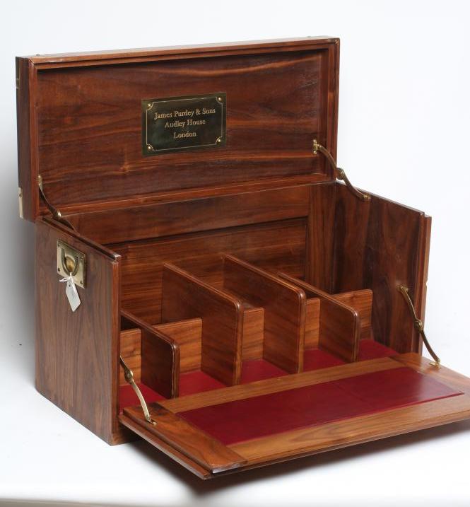 A JAMES PURDEY & SONS FRUITWOOD IN CAR DRINKS CABINET with brass campaign style handles and corners, Image