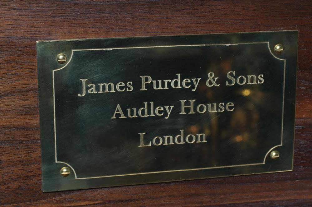 A JAMES PURDEY & SONS FRUITWOOD IN CAR DRINKS CABINET with brass campaign style handles and corners, Image