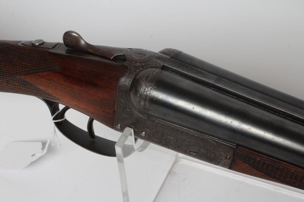 A WEBLEY & SCOTT 12 BORE SIDE BY SIDE SHOTGUN Image