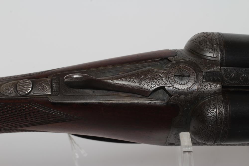 A WEBLEY & SCOTT 12 BORE SIDE BY SIDE SHOTGUN Image