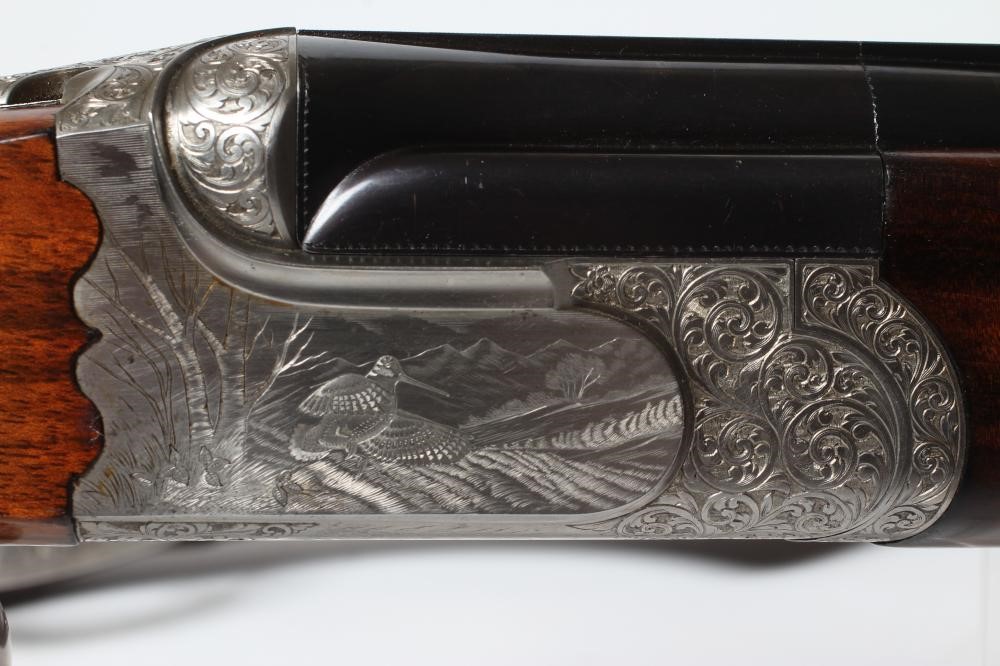 A PAIR OF ALEX MARTIN OVER & UNDER 12 BORE SHOTGUNS Image