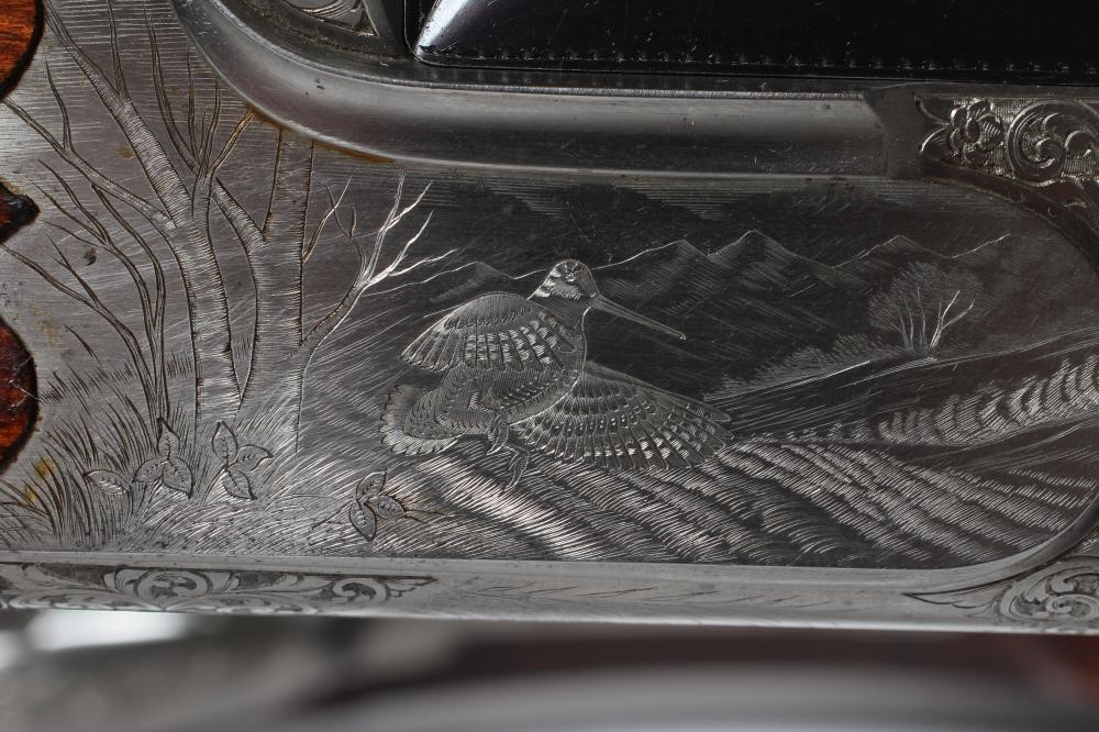 A PAIR OF ALEX MARTIN OVER & UNDER 12 BORE SHOTGUNS Image