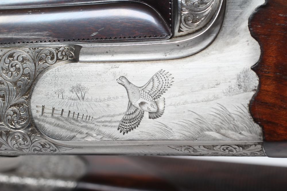 A PAIR OF ALEX MARTIN OVER & UNDER 12 BORE SHOTGUNS Image
