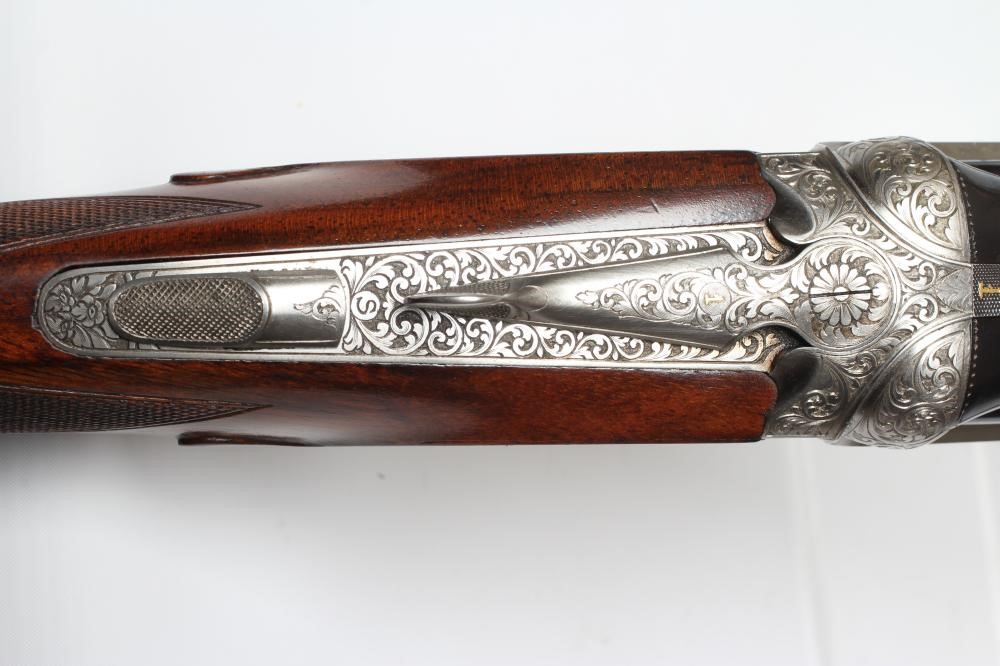 A PAIR OF ALEX MARTIN OVER & UNDER 12 BORE SHOTGUNS Image