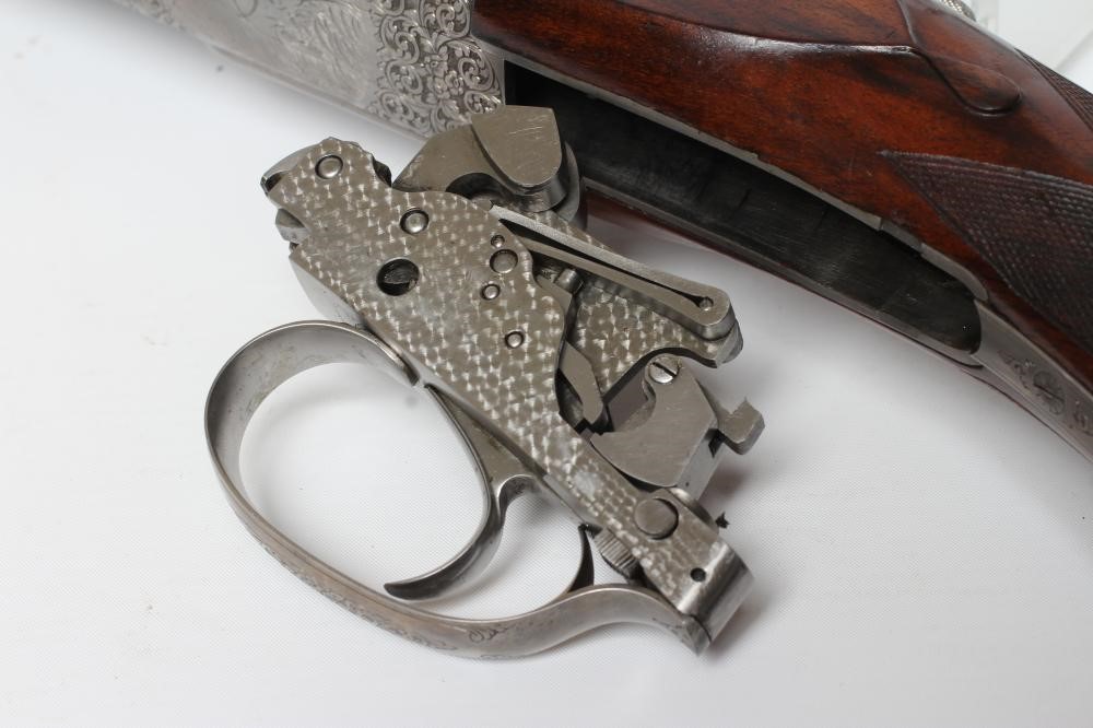 A PAIR OF ALEX MARTIN OVER & UNDER 12 BORE SHOTGUNS Image