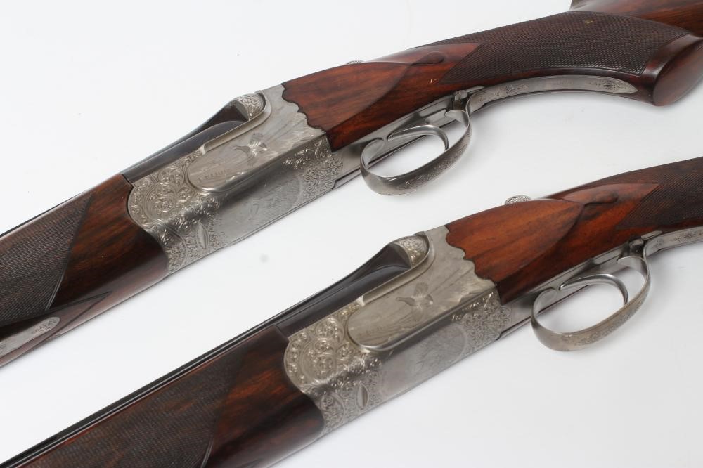 A PAIR OF ALEX MARTIN OVER & UNDER 12 BORE SHOTGUNS Image