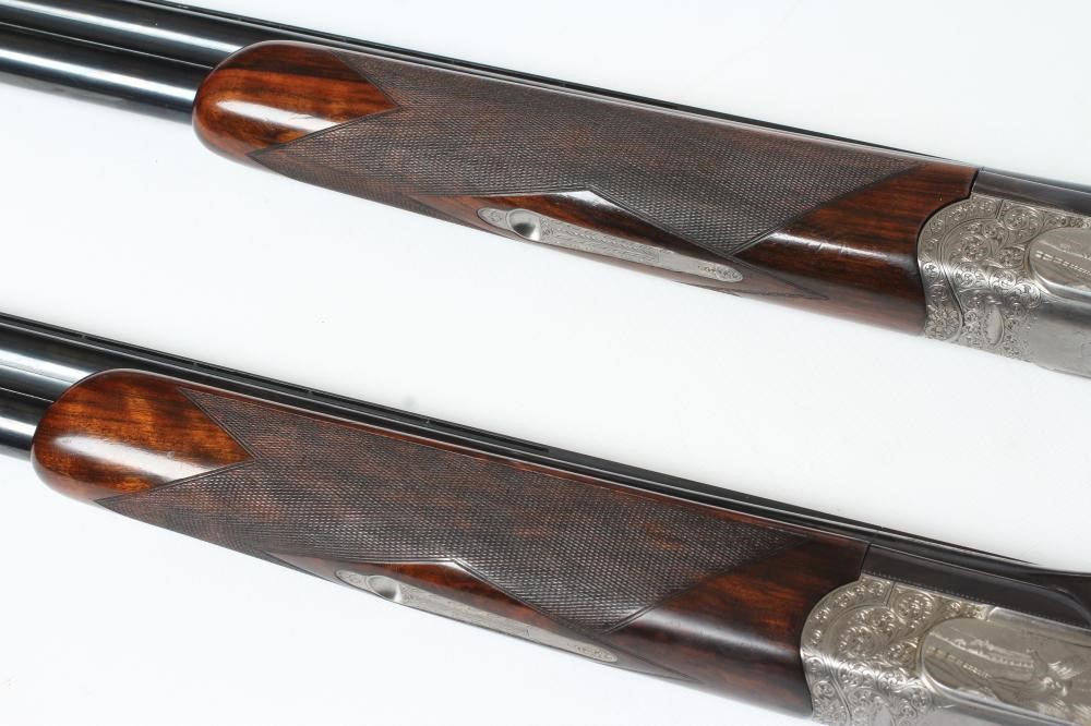 A PAIR OF ALEX MARTIN OVER & UNDER 12 BORE SHOTGUNS Image