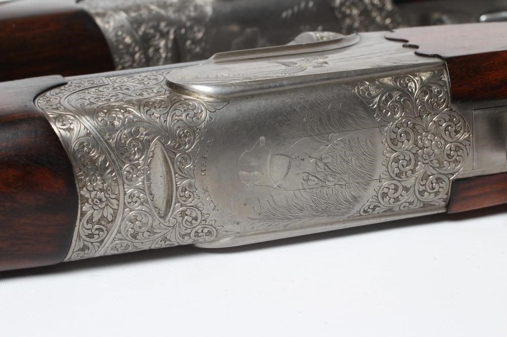 A PAIR OF ALEX MARTIN OVER & UNDER 12 BORE SHOTGUNS Image