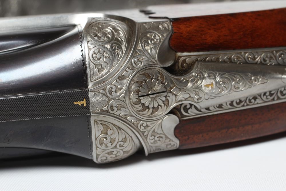 A PAIR OF ALEX MARTIN OVER & UNDER 12 BORE SHOTGUNS Image