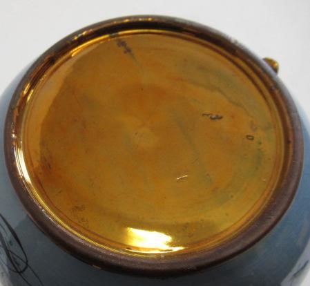 A DOCUMENTARY COPPER LUSTRE JUG Image