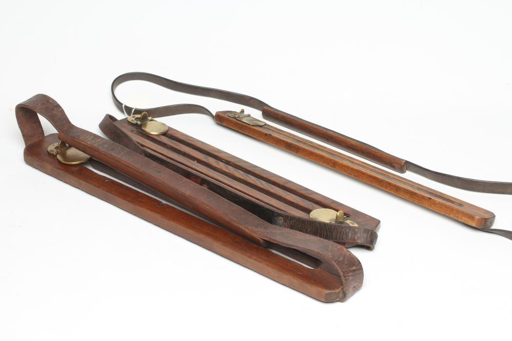 THREE OAK GAME CARRIERS, one antique example marked A & N.C.S.L., two other vintage examples Image