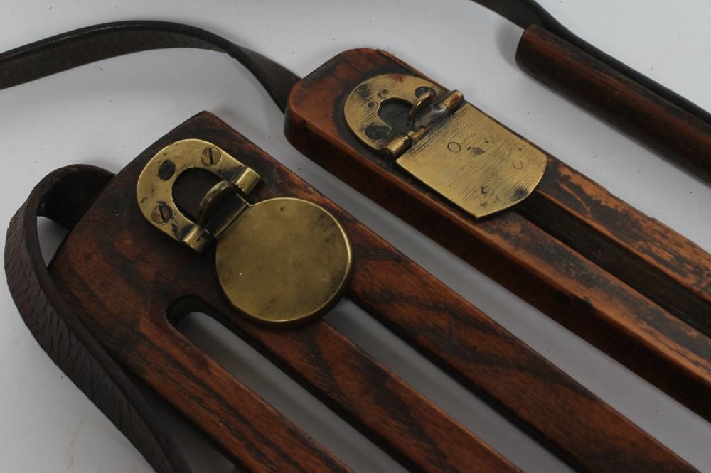 THREE OAK GAME CARRIERS, one antique example marked A & N.C.S.L., two other vintage examples Image