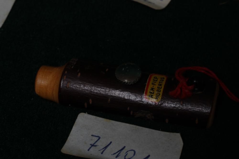 A RARE VINTAGE TRAVELLING SALESMAN'S CASE OF ANIMAL CALLS AND HUNTING WHISTLES Image