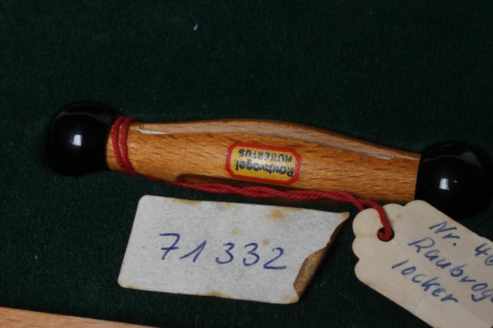 A RARE VINTAGE TRAVELLING SALESMAN'S CASE OF ANIMAL CALLS AND HUNTING WHISTLES Image