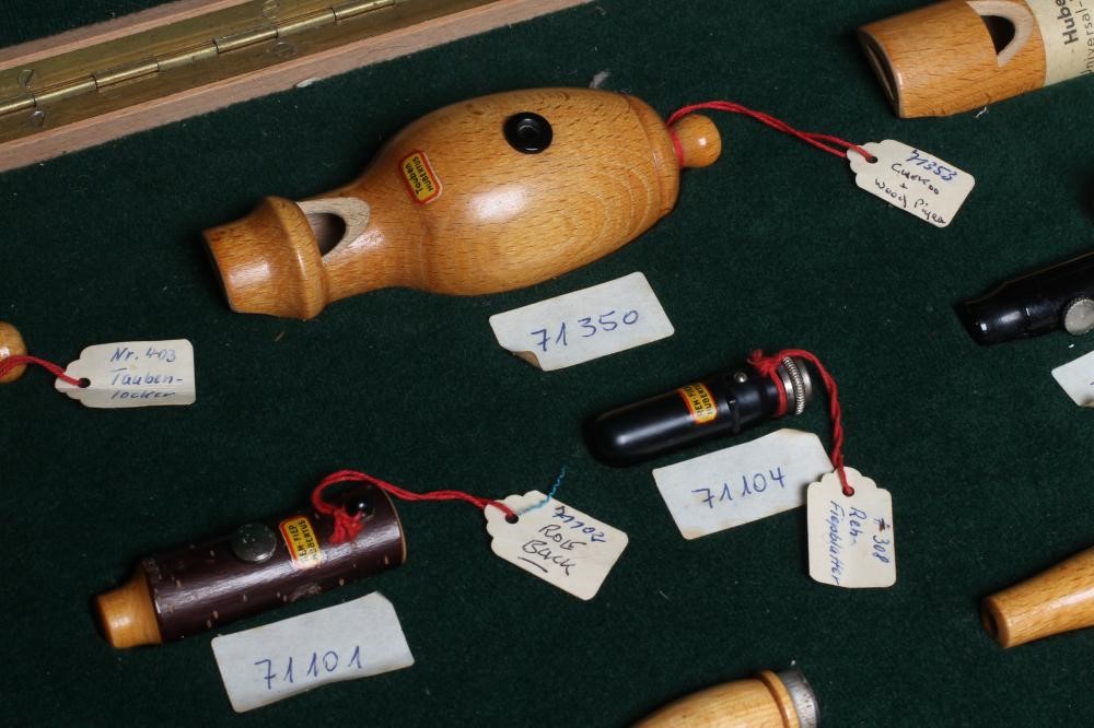 A RARE VINTAGE TRAVELLING SALESMAN'S CASE OF ANIMAL CALLS AND HUNTING WHISTLES Image