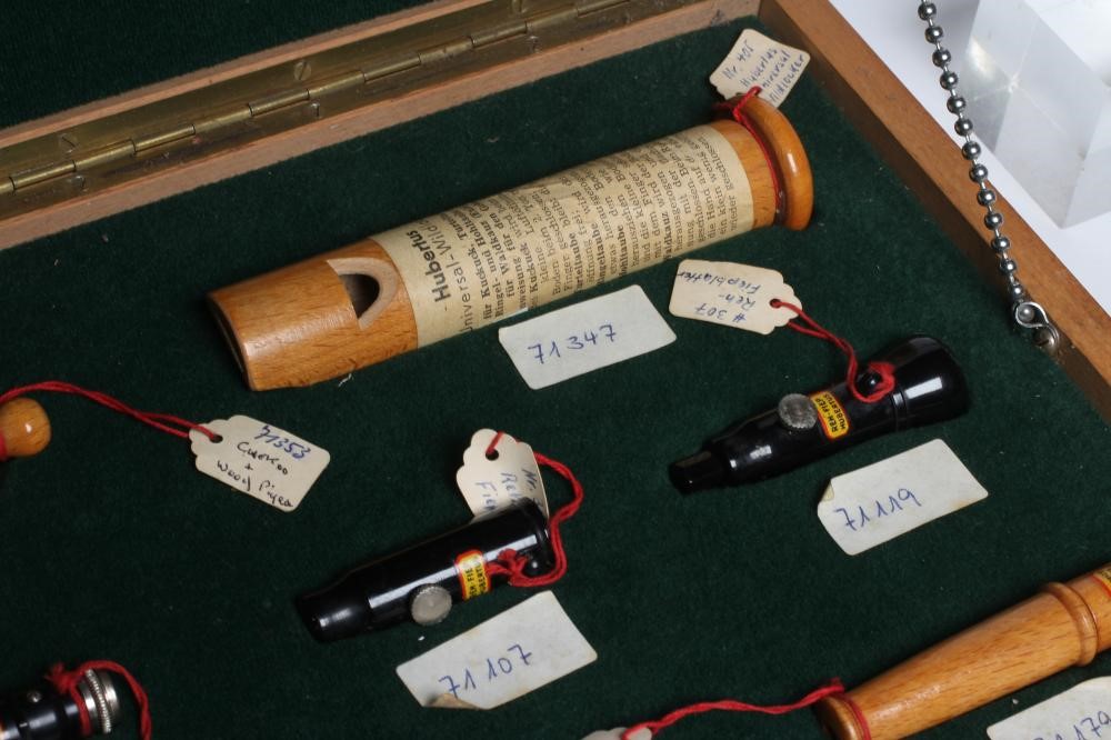 A RARE VINTAGE TRAVELLING SALESMAN'S CASE OF ANIMAL CALLS AND HUNTING WHISTLES Image