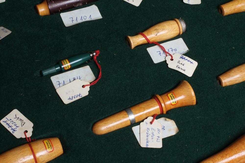 A RARE VINTAGE TRAVELLING SALESMAN'S CASE OF ANIMAL CALLS AND HUNTING WHISTLES Image