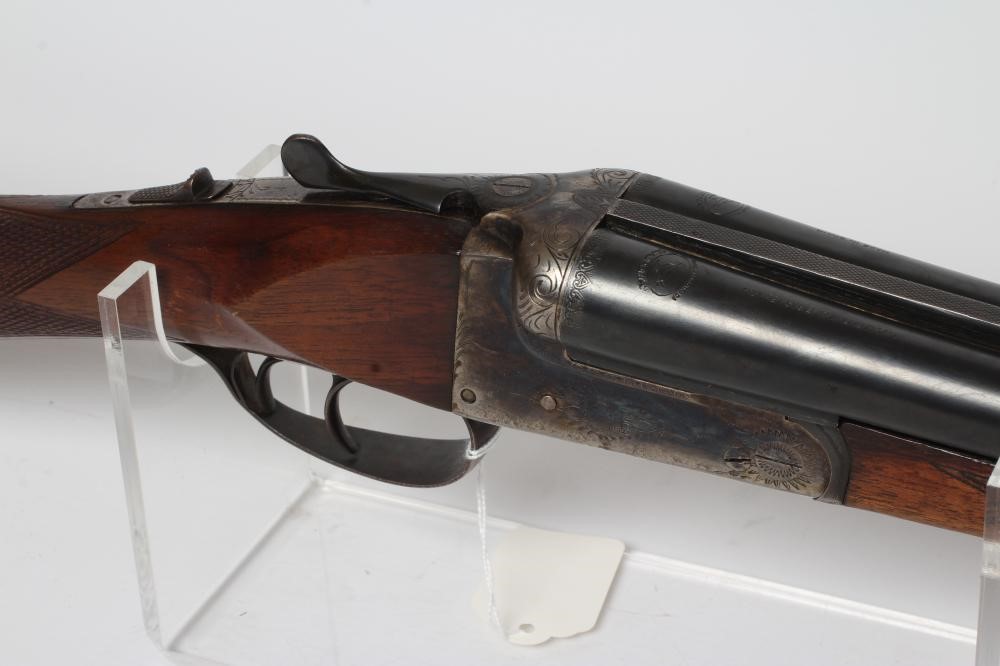 A LAURONA 20 BORE SIDE BY SIDE SHOTGUN, with 27 3/4" barrels and manual safety, 44 3/4" overall Image